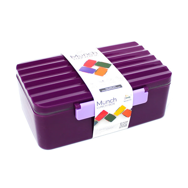 A purple plastic lunch box with a ridged lid and light purple latch, wrapped in a white paper band labeled 'Munch Lunch Box'.