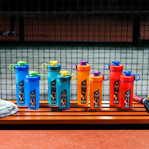 Colorful sports bottles with colorful lids on a wooden surface.